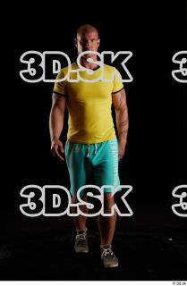 Walking reference of yellow shirt turquoise shorts brown shoes Leland…